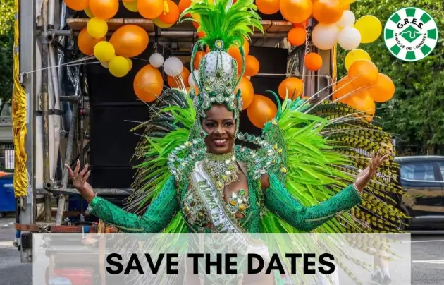 Queen Keon with Balloons. Keon wears her signature green feathered samba costume