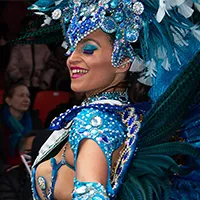 Profile picture of Samba dancer with blue jewels and blue feathered headpiece