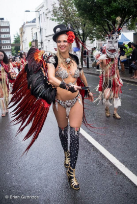 Carnival 2015- Solo dancer wearing black and red and a top hat - Copyright Brian Guttridge