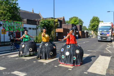 Carnival 2019 -Baianas on crossing with their arms out - Copyright Brian Guttridge