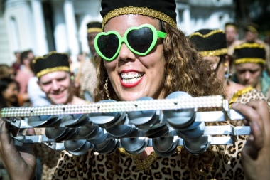 Carnival_2017 - percussion player smiling at camera wearing green heart glasses