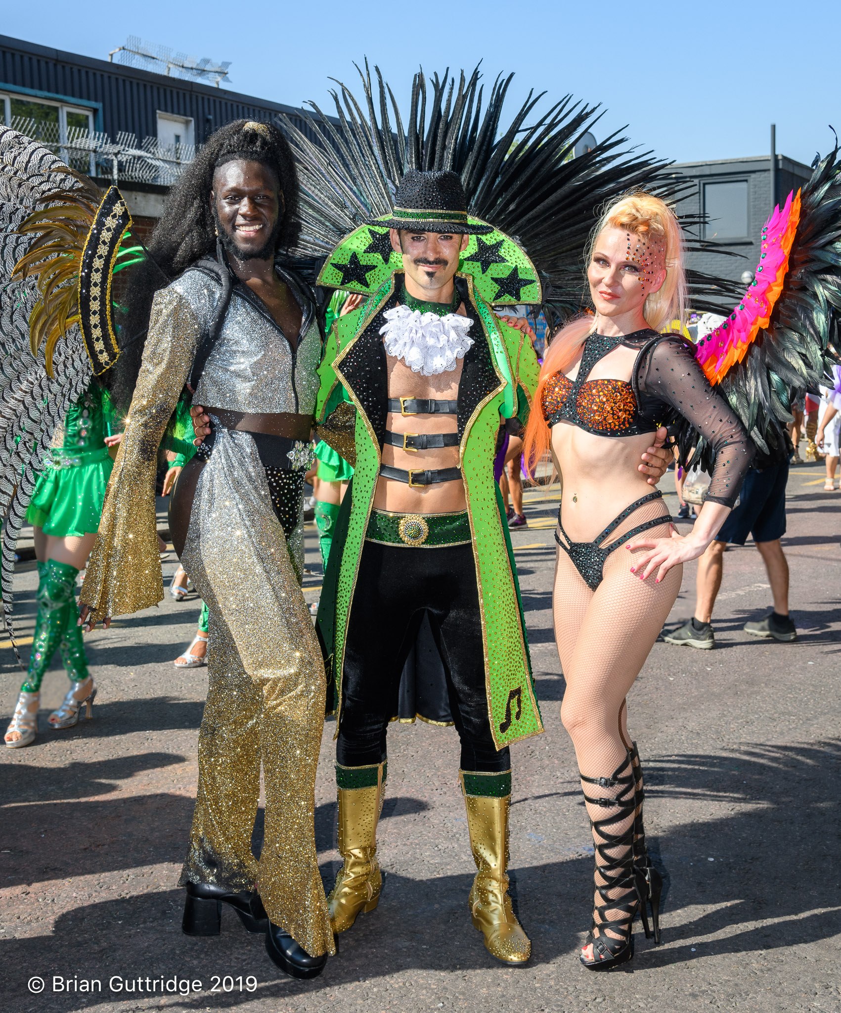 LSS Notting Hill Carnival 2019- three people in different costumes - Copyright Brian Guttridge