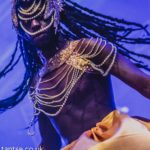 One of the samba queens with beads and hair flying as she turns