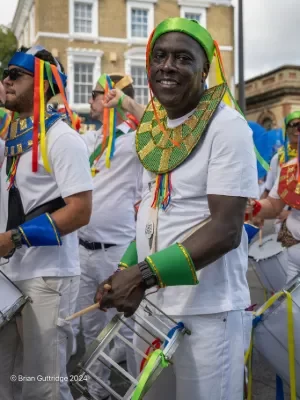 2024_Carnival Man smiling with Drum - Copyright Brian Guttridge