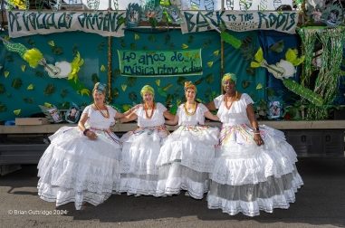 2024 Carnival - Baianas Infront Of Float- Copyright Brian Guttridge