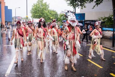 Carnival 2015- group of dancers in street in voodoo costume- Copyright Brian Guttridge