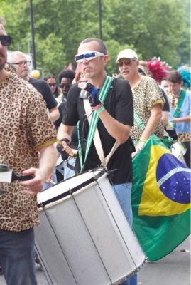 Carnival 2022 - Bateria drummer in line with other band members - Copyright Paul Lipiatt