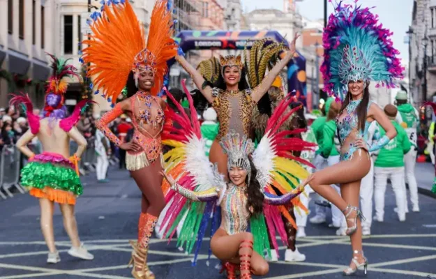 Dancers in feathers and samba costumes on Jan 1st 2026 for the London Parade - Copy right Dinendra Haria