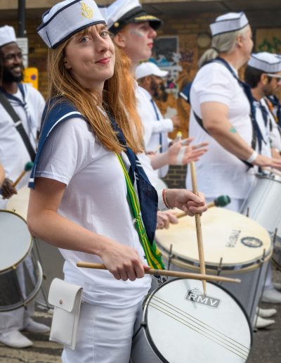 Stacey Fawcett playing drums in the bateria - band dance teacher at the school - Copyright Brian Guttridge